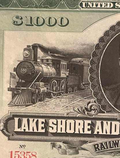 Close-up of vintage $1000 bond certificate detail showing steam locomotive No. 590 with "Lake Shore and Railroad" text, seria