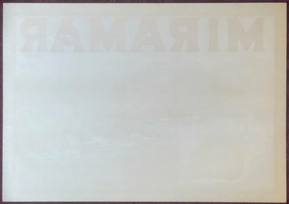 Faded vintage Miramar Sunkist lemon crate label showing watermarked text on cream-colored paper, photographed flat against ne