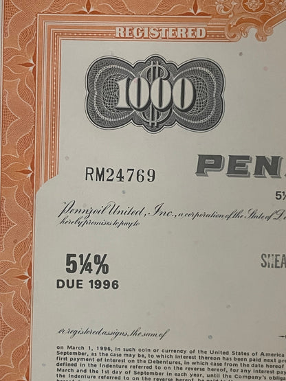 Registered stock certificate for 1000 shares at 5¼% due, issued by Pennzoil United Inc., with orange decorative border a
