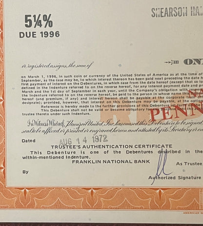 Close-up of vintage stock certificate showing 5¼% interest rate due, with Franklin National Bank