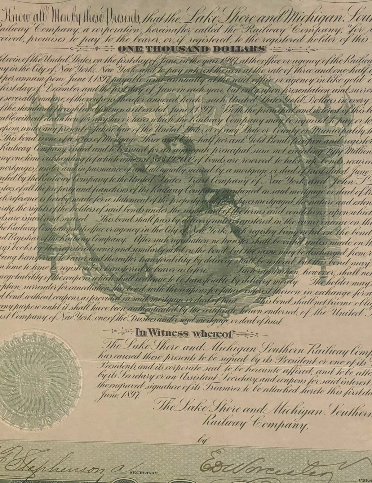Aged parchment-colored bond certificate with ornate script text, official seal on left, and signature lines at bottom for Lak