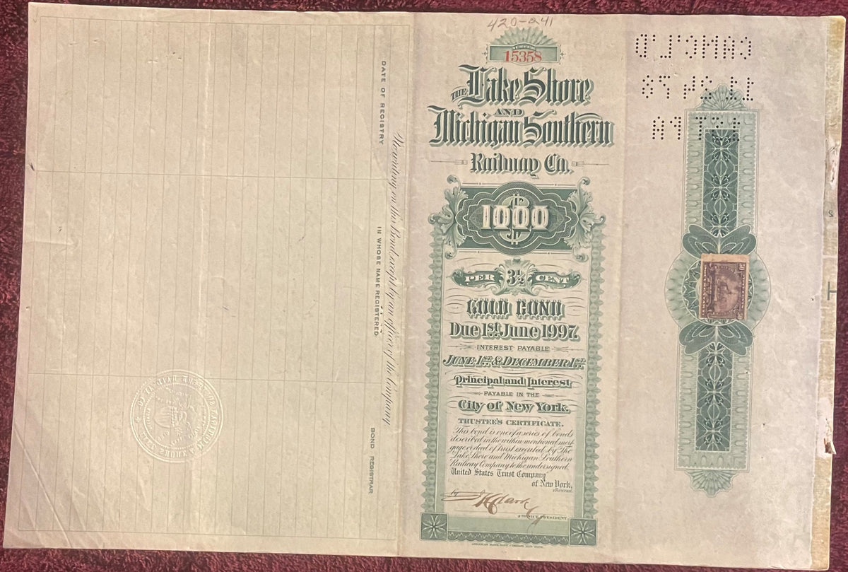 Vintage 1897 Lake Shore and Michigan Southern Railway $1000 gold bond certificate with green ornamental border and coupon she