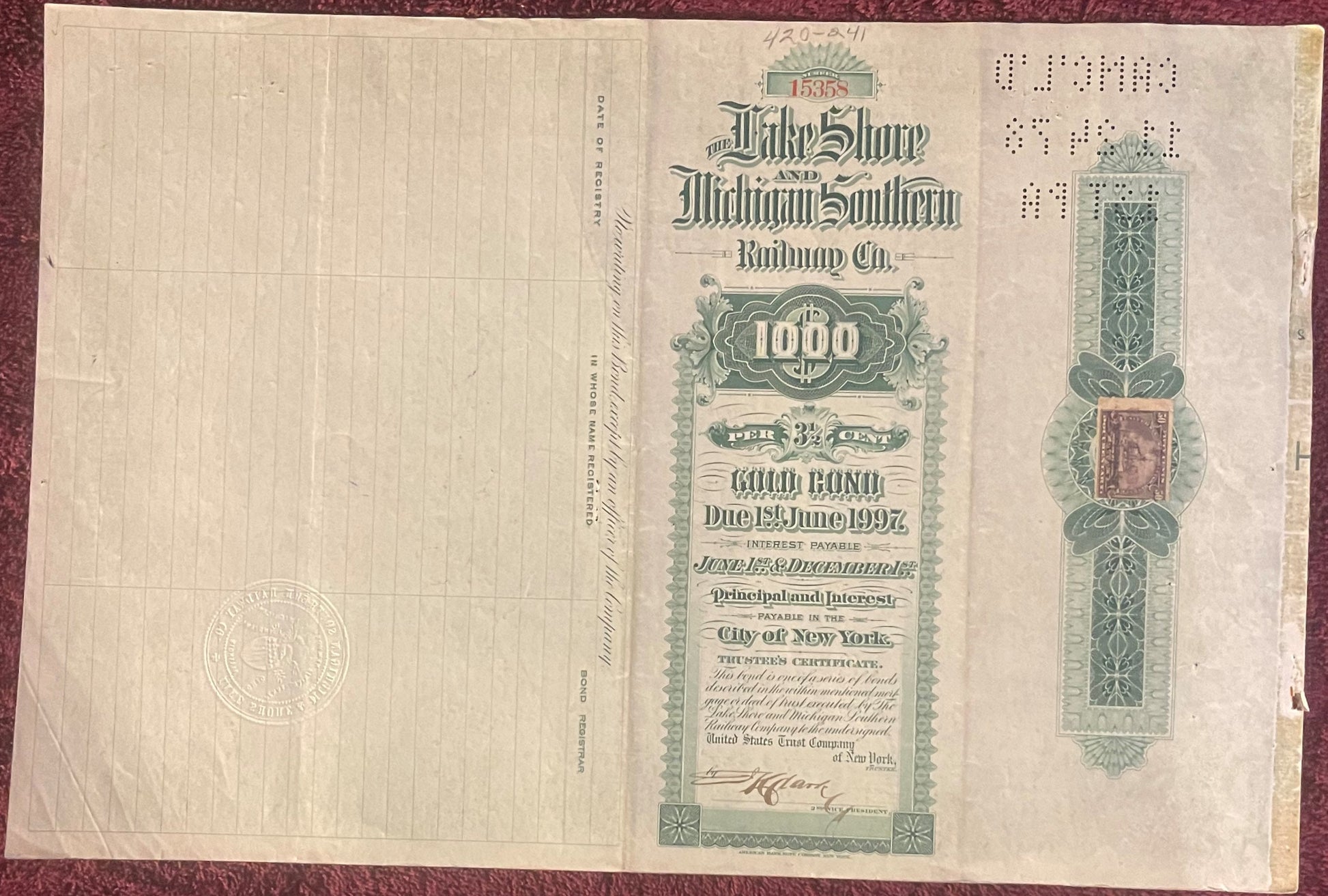 Vintage 1897 Lake Shore and Michigan Southern Railway $1000 gold bond certificate with green ornamental border and coupon she