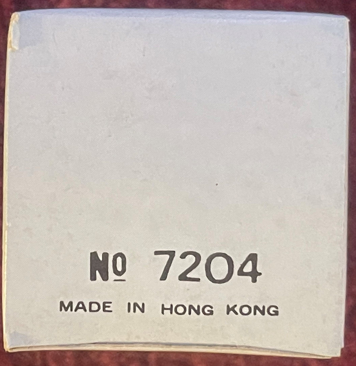Box back printed “No 7204” and “MADE IN HONG KONG” in black on cream card.