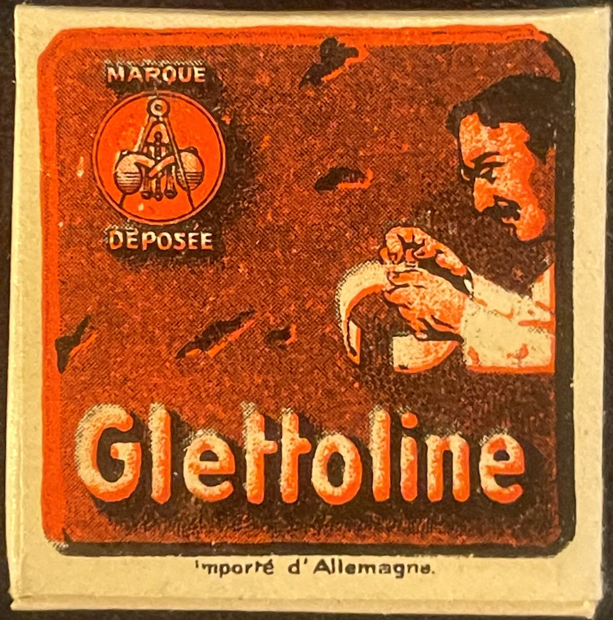 Unopened vintage Glattolin wax box with orange and brown label showing a man's profile and German text "Importé d'Allemagne