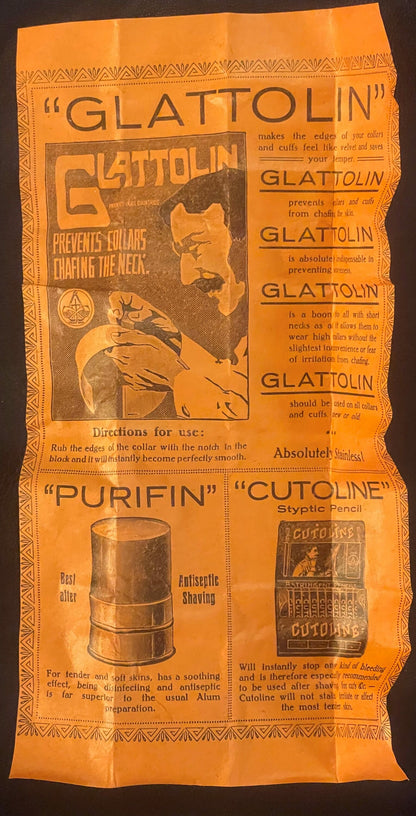 Antique orange cardboard box for Glattolin collar remedy featuring product information and illustrated man's face, displayed 