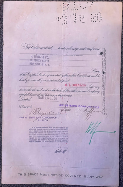 Pink stock certificate with printed text and handwritten signatures, issued by Swiss Bank Corporation Zu