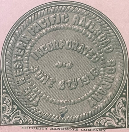 Close-up of ornate circular embossed design from 1945 Western Pacific Railroad bond certificate with decorative border and "S