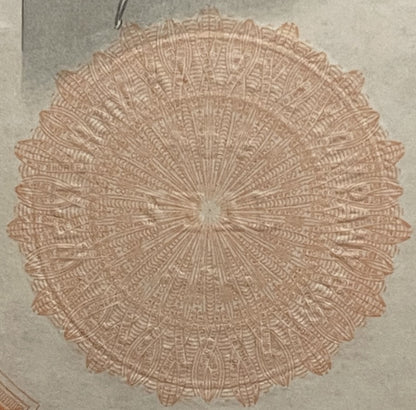 Ornate circular rosette pattern with radiating geometric lines in tan and cream on pale background, detail of decorative bond