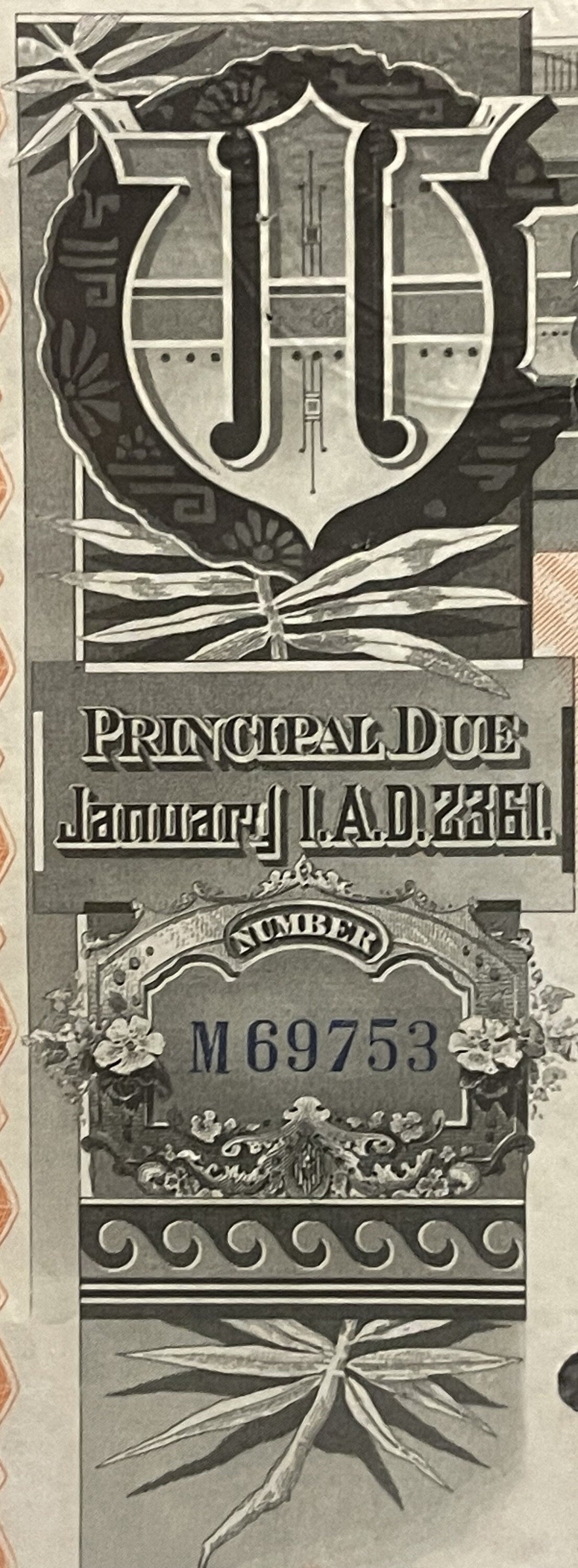 Close-up of ornate bond certificate header with decorative shield monogram, "Principal Due January 1 A.D. 2361" text, and ser