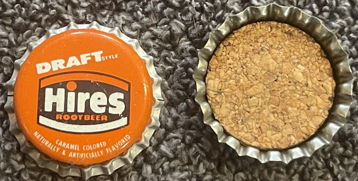 Vintage Hires root beer bottle cap shown front and back, orange side displays "Draft Style" and "Hires Root Beer" text, rever