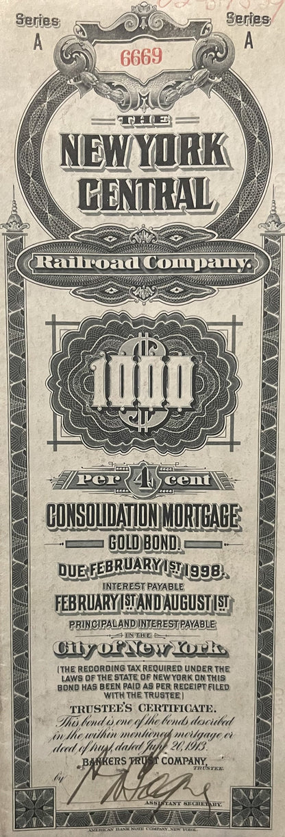 Antique stock certificate for New York Central Railroad $1000 gold bond from 1913, printed in black on aged cream paper with 