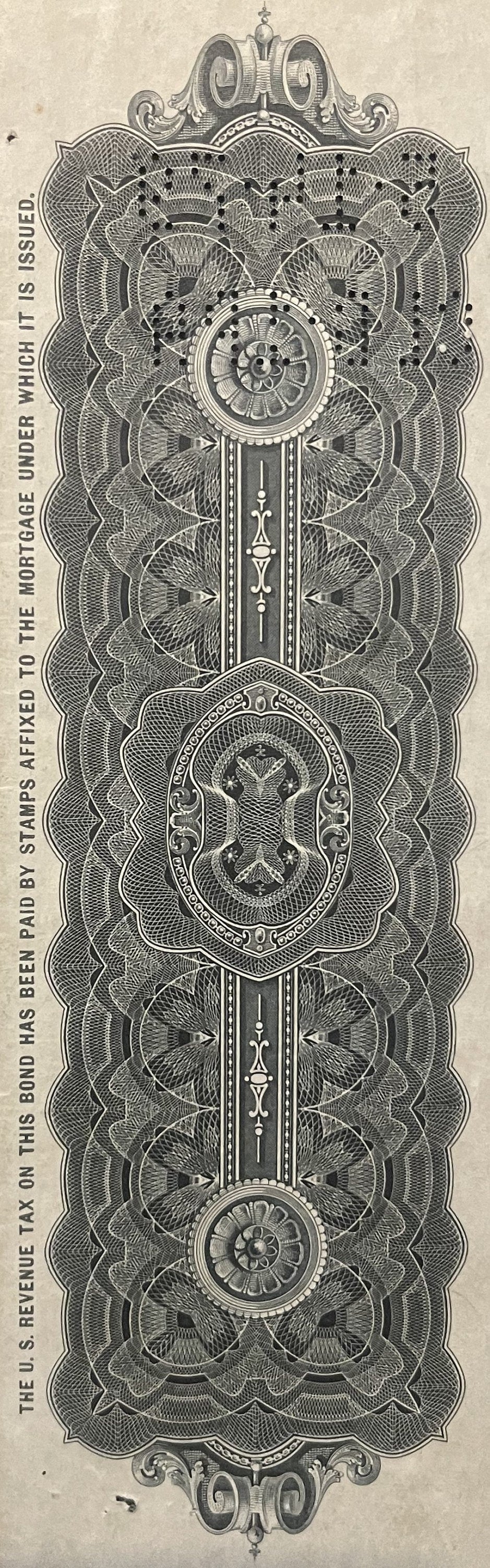 Ornate engraved bond certificate featuring symmetrical floral and geometric patterns, central circular medallions, decorative