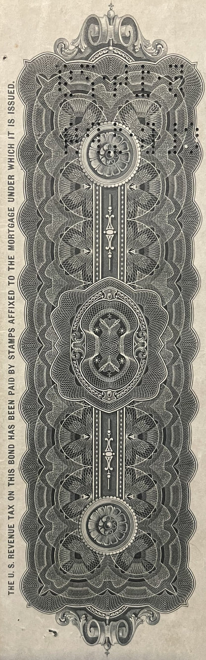 Ornate engraved bond certificate featuring symmetrical floral and geometric patterns, central circular medallions, decorative