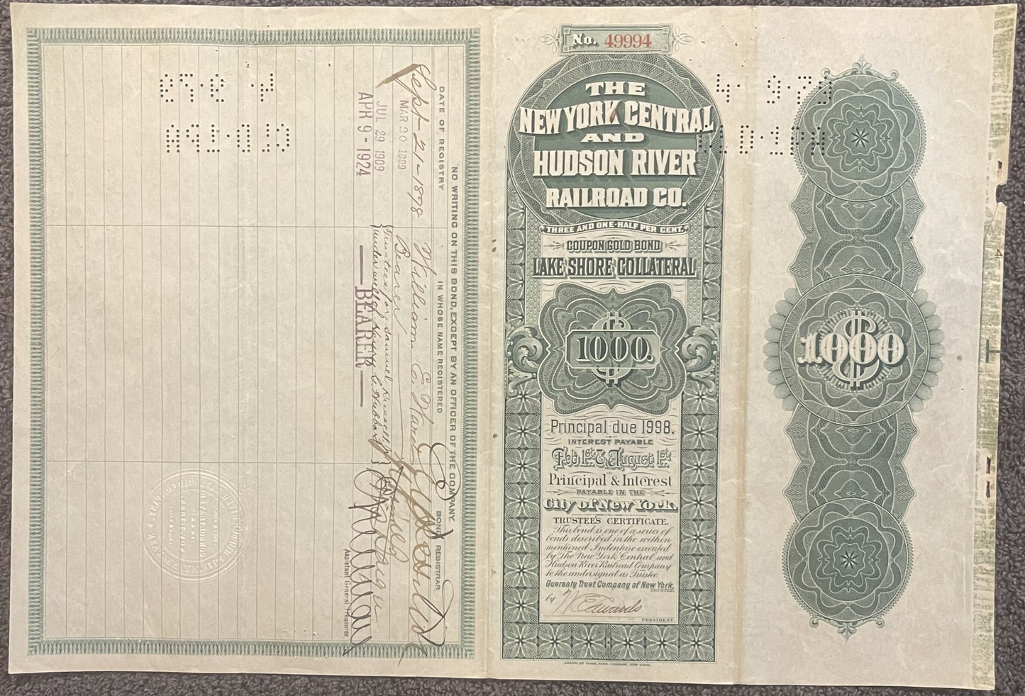 Vintage 1898 New York Central and Hudson River Railroad gold bond for $1000, showing ornate green engra
