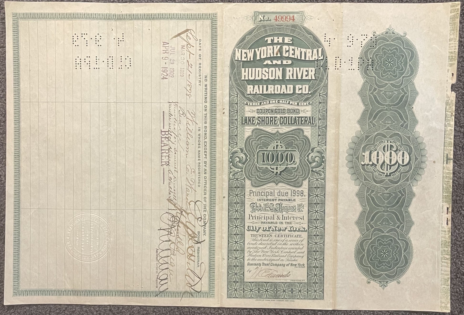 Vintage 1898 New York Central and Hudson River Railroad gold bond for $1000, showing ornate green engra