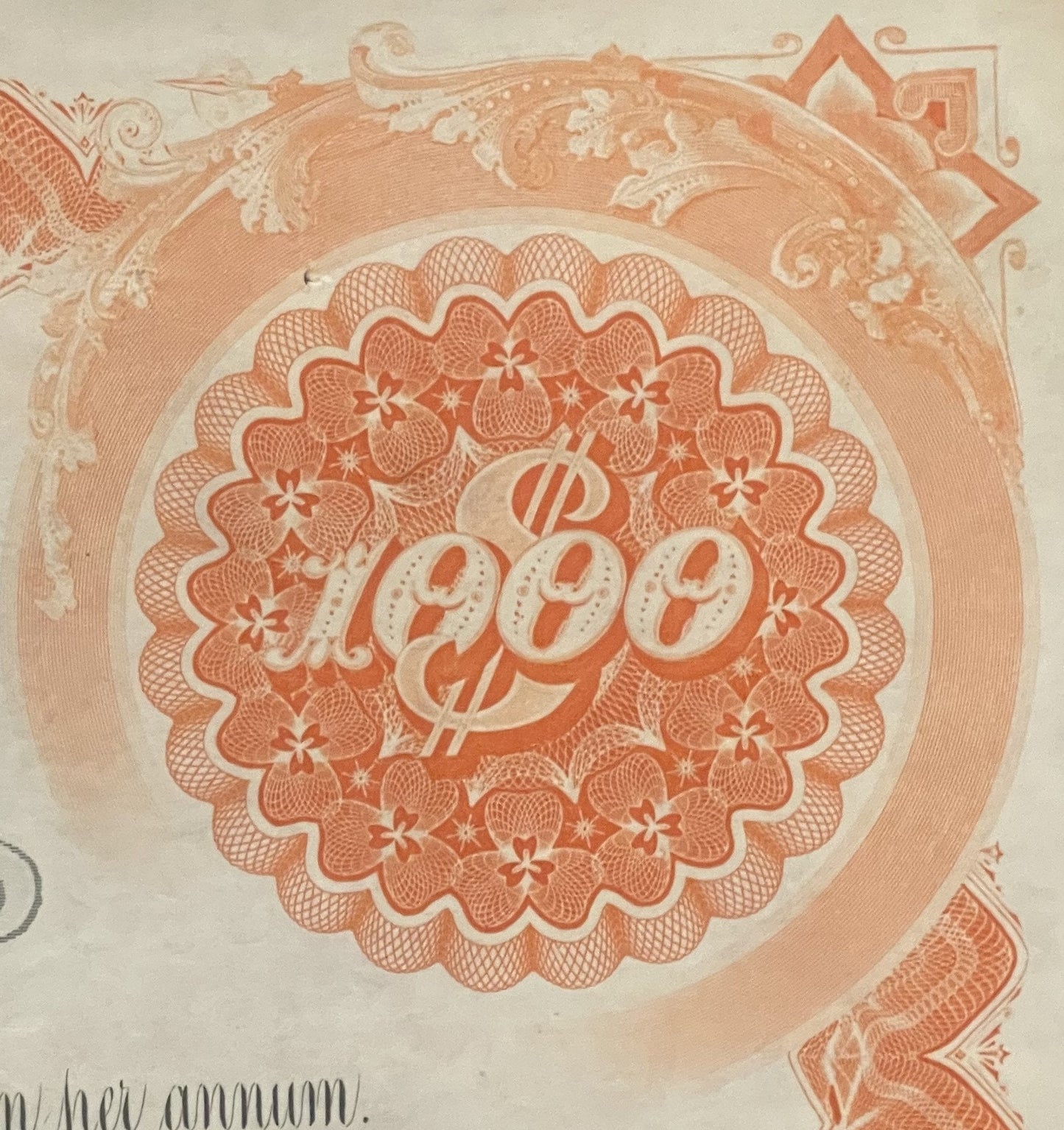 Close-up of ornate orange and cream 1942 West Shore Railroad bond certificate with decorative scalloped medallion featuring "