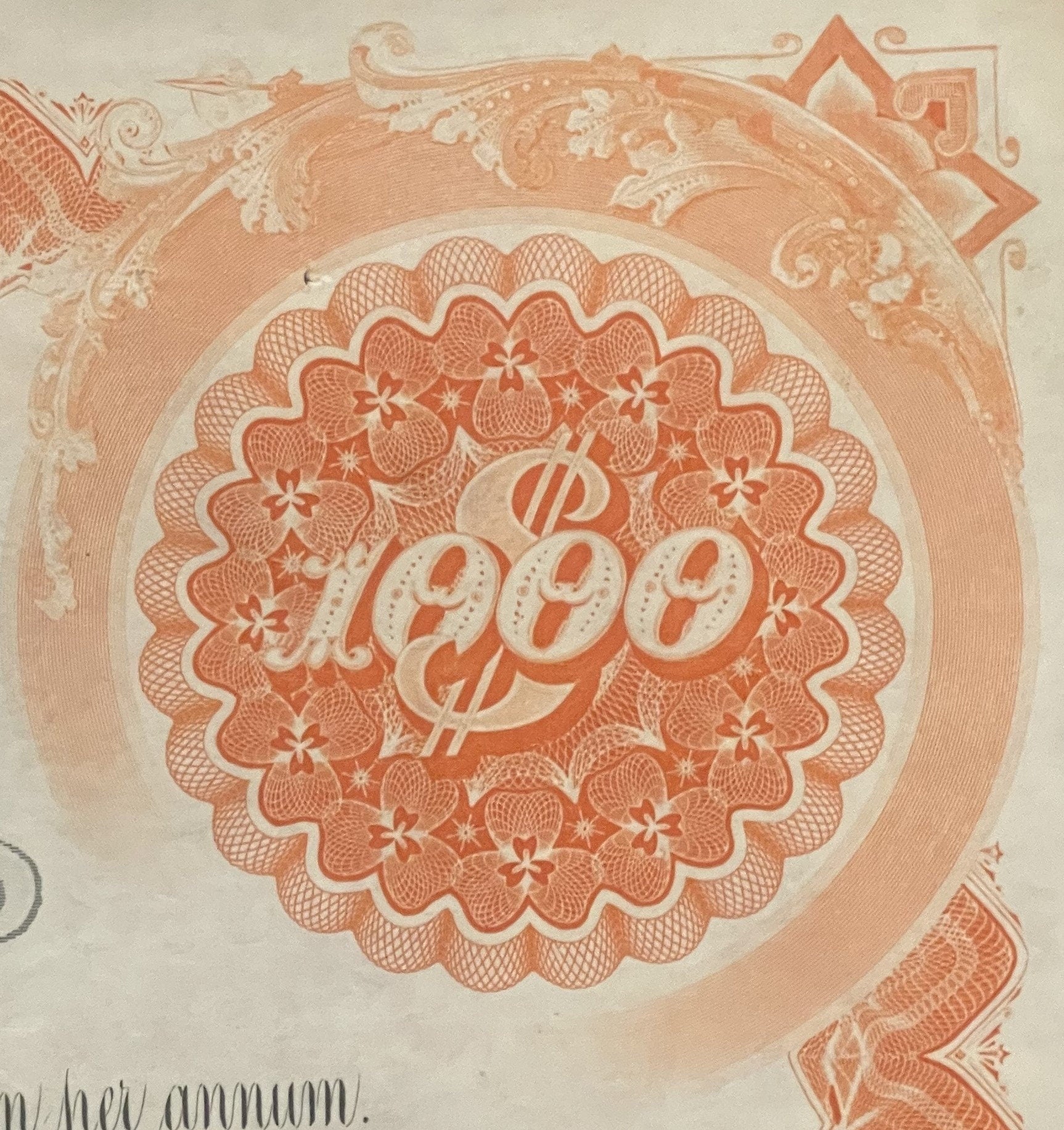 Close-up of ornate orange and cream 1942 West Shore Railroad bond certificate with decorative scalloped medallion featuring "