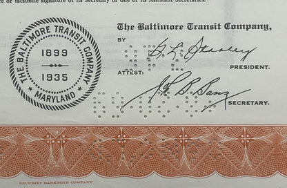 Upper portion of vintage Baltimore Transit Company bond certificate with 1899-1935 seal, signatures, and decorative lower bor