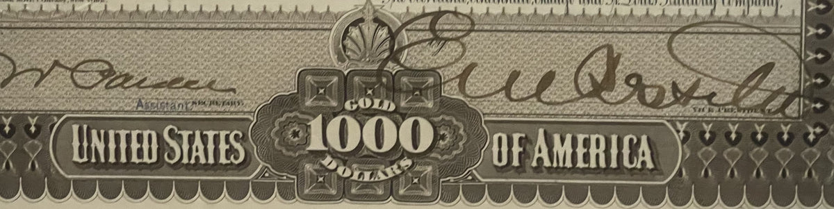Close-up of ornate 1000 gold bond certificate header showing "United States of America" text with decorative embossing and ru