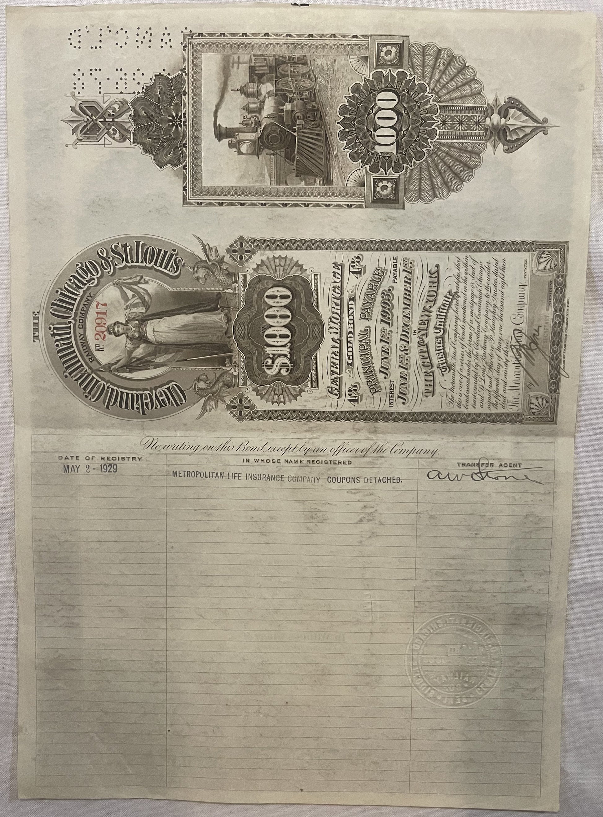 Vintage bond certificate pages showing ornate $1,000 denomination with decorative borders, portraits, and "Metropolitan Life 