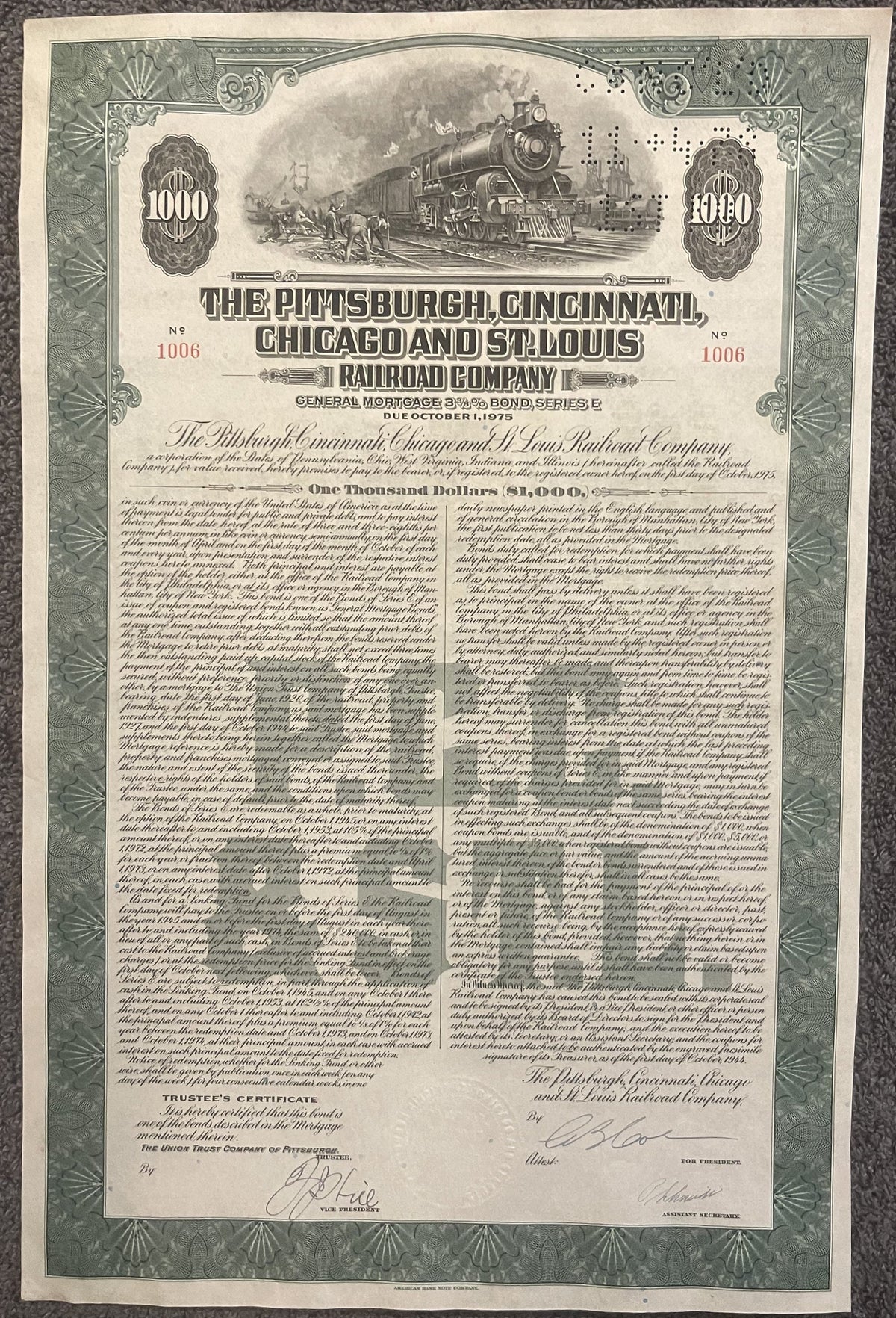 Vintage railroad bond certificate for Pittsburgh, Cincinnati, Chicago & St. Louis Railroad showing steam locomotive, ornate g