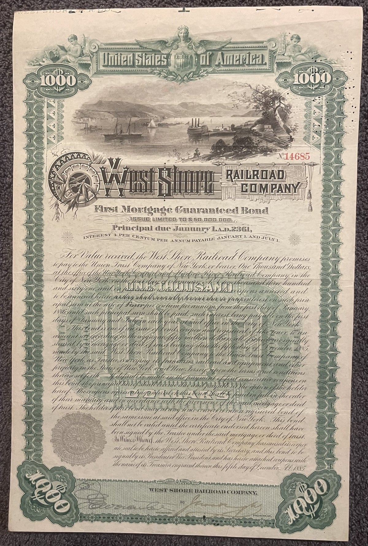Ornate 1885 West Shore Railroad $1,000 gold bond certificate with green decorative borders, steamship vignette, and attached 