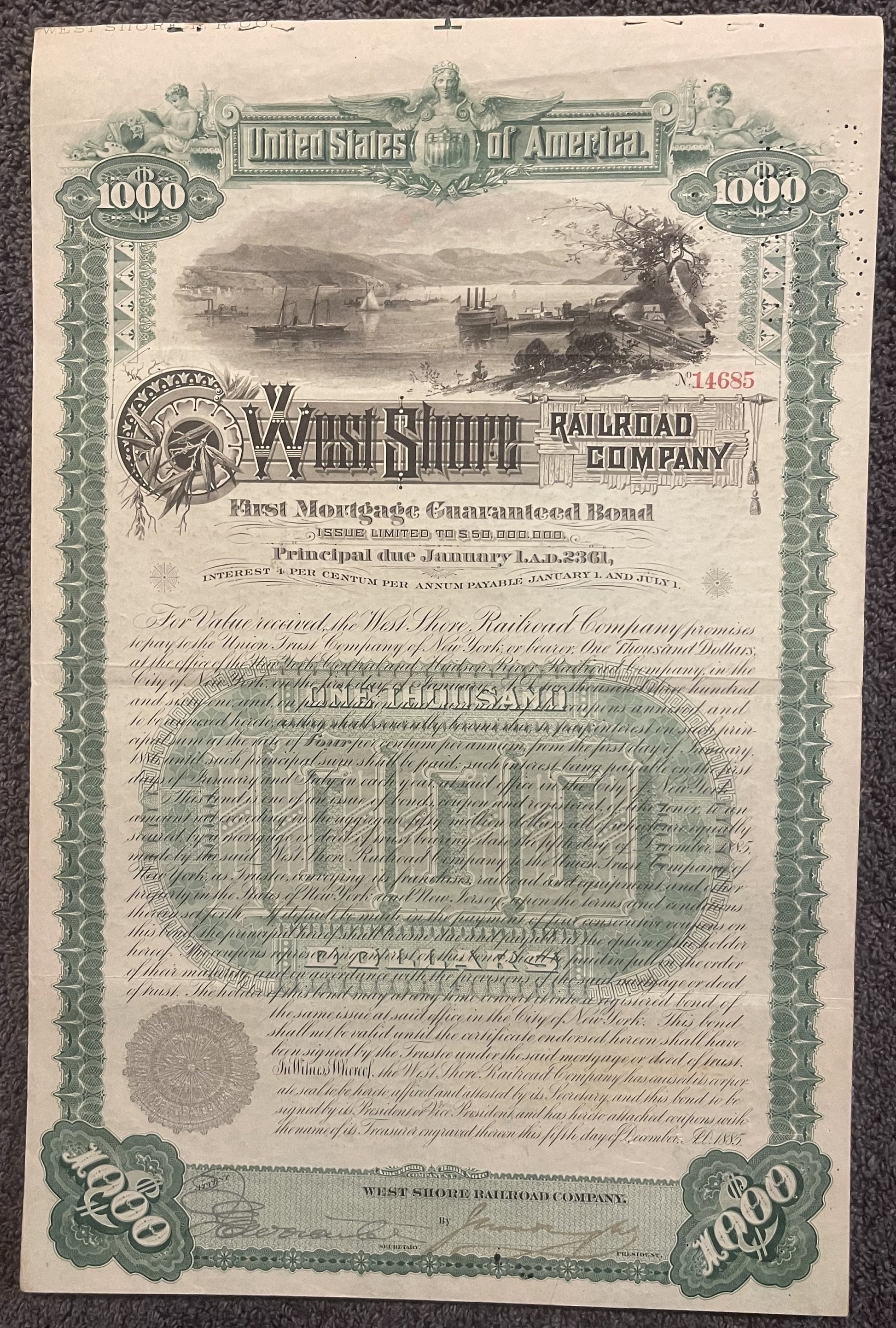 Ornate 1885 West Shore Railroad $1,000 gold bond certificate with green decorative borders, steamship vignette, and attached 
