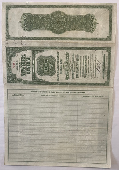 Vintage New York Central Railroad $1,000 bond certificate from 1913 with ornate green decorative borders and registration sec