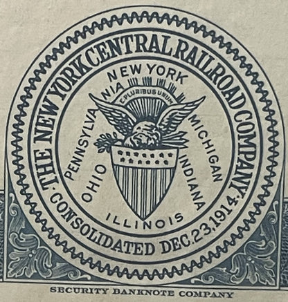 Circular seal of New York Central Railroad with eagle emblem, text reading "Consolidated Dec 23, 1961," printed in black ink 