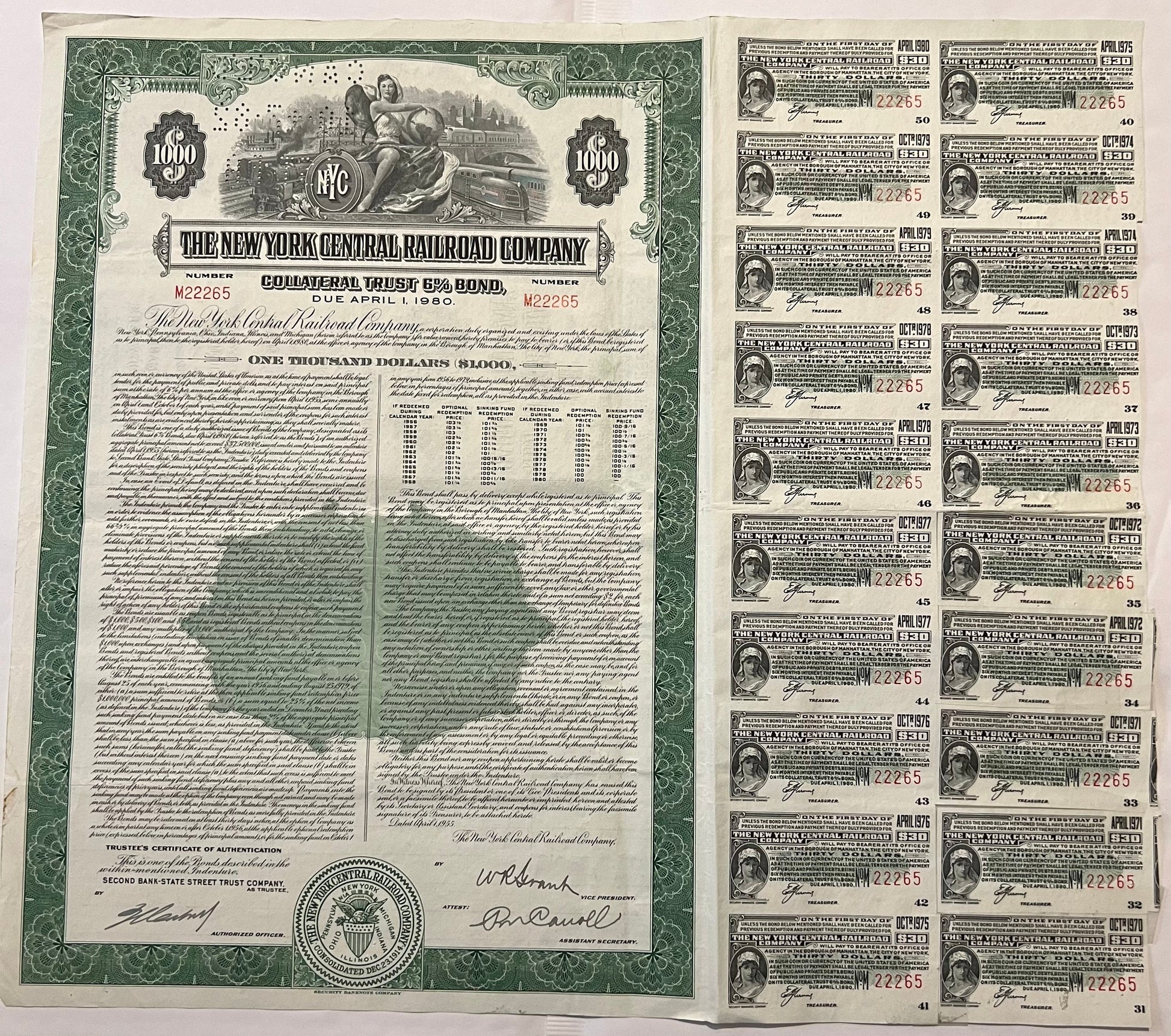 Vintage 1955 New York Central Railroad $1,000 bond certificate with green border and attached coupons, displayed flat showing