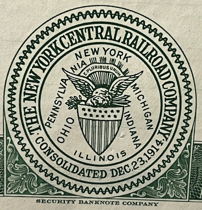Ornate circular seal of New York Central Railroad Company printed in black on cream paper, showing eagle emblem and text read