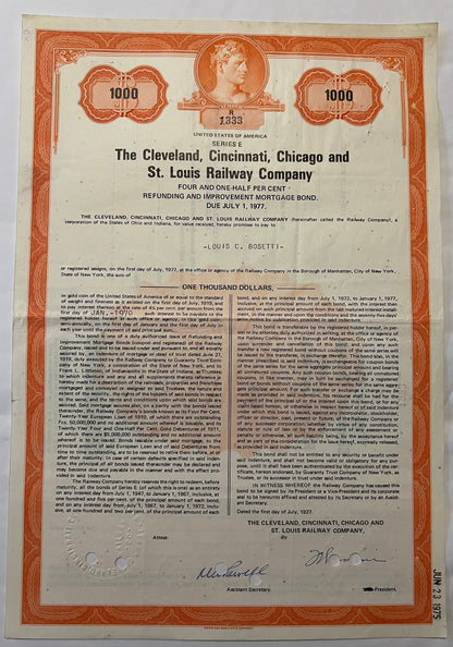 Full page of 1927 railroad bond certificate with orange decorative border, portrait medallion, and black text on cream paper,