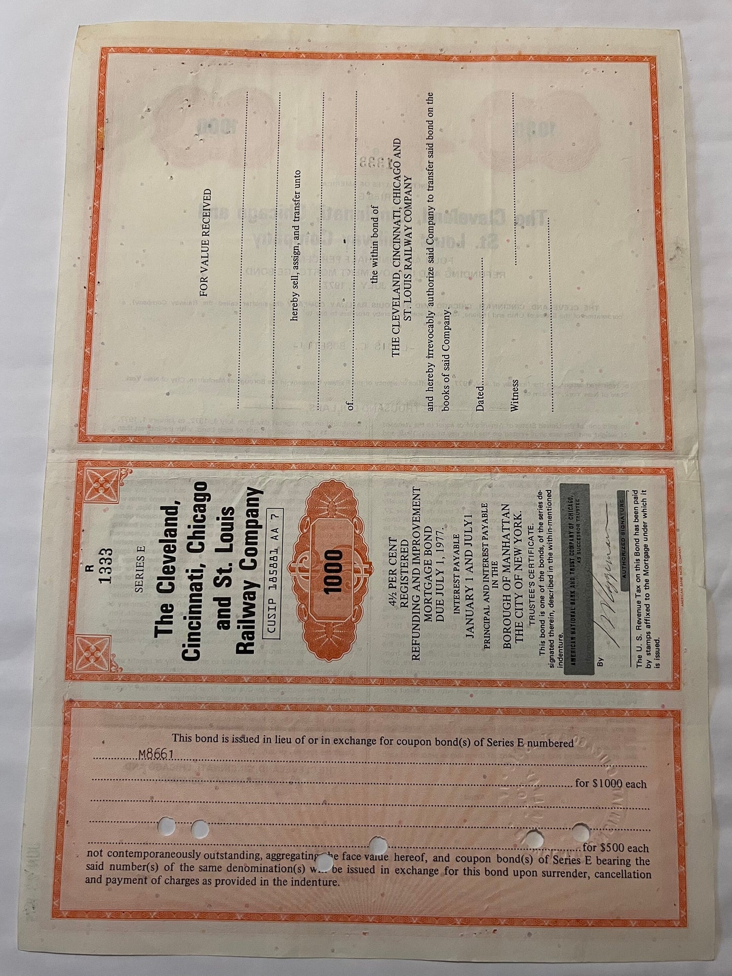 Vintage 1927 railroad bond certificate with orange border and decorative head design, numbered 100, for Cleveland Cincinnati 