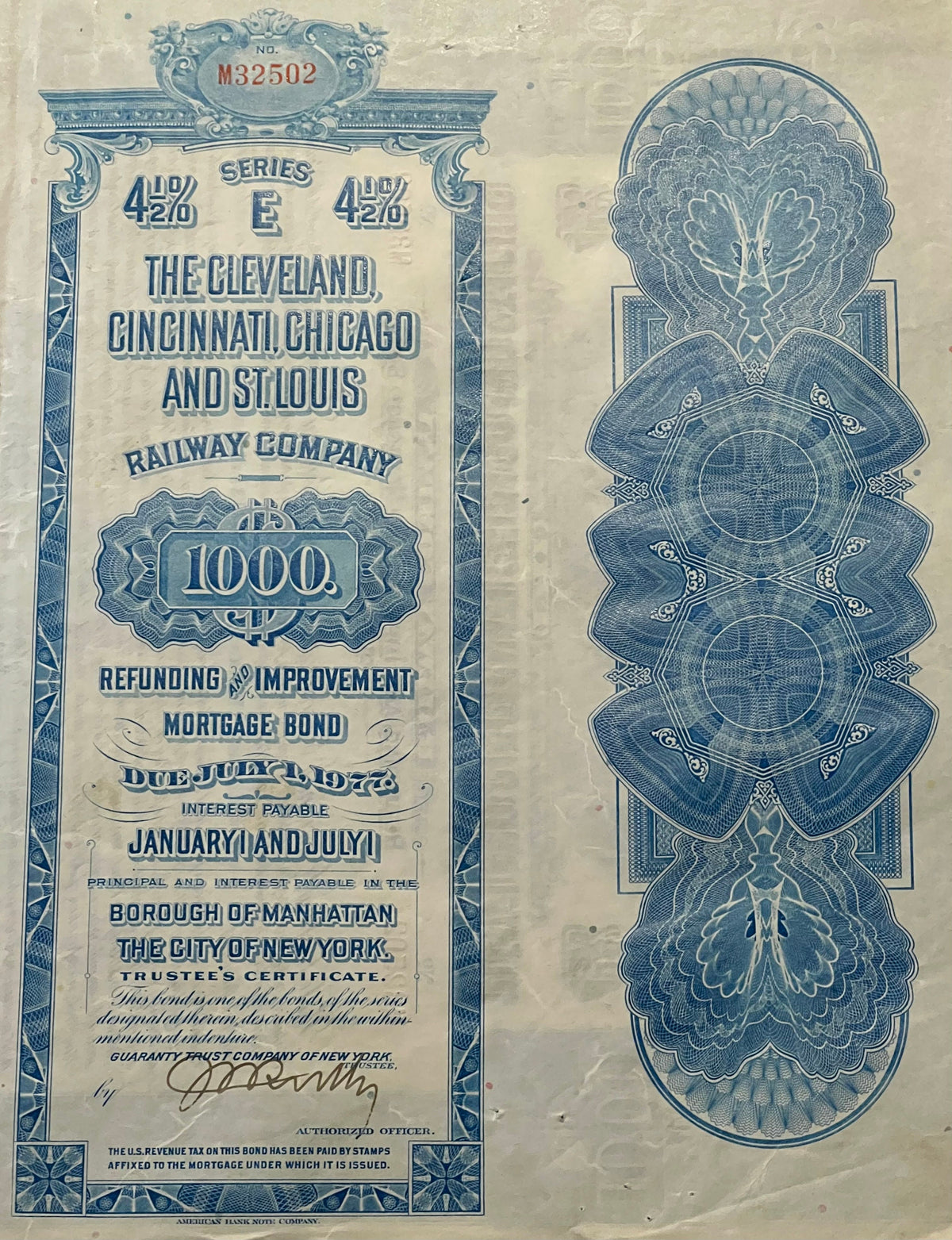 Front and back of a blue and cream 1927 railroad bond certificate for $1000, featuring ornate decorative borders and an eagle