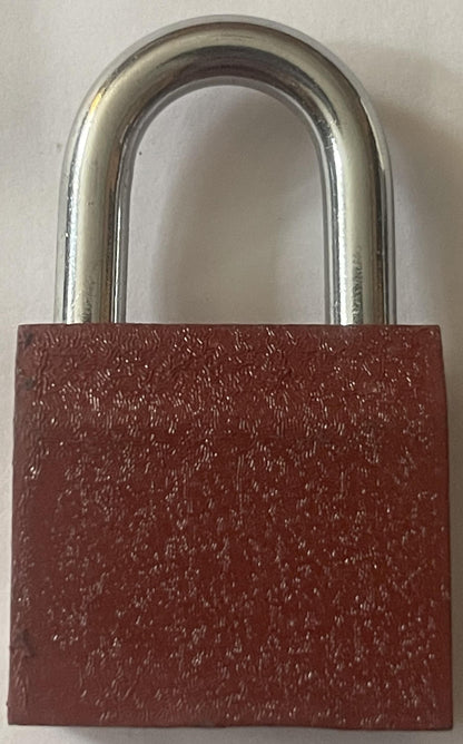 Vintage padlock with silver metal U-shaped shackle and deep red textured body against white background