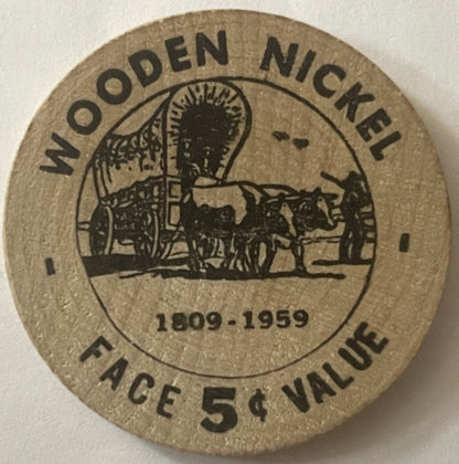 Wooden quarter commemorating Wooden quarter Face 5¢ Value 1809-1959, featuring horse-drawn carriage illustration and Albert Lea