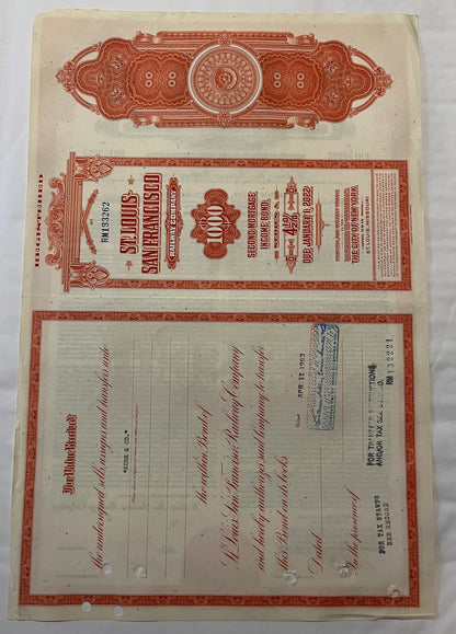 Vintage Frisco Railroad $1,000 gold bond certificate from 1963 with red ornamental borders and decorative emblems, displayed 