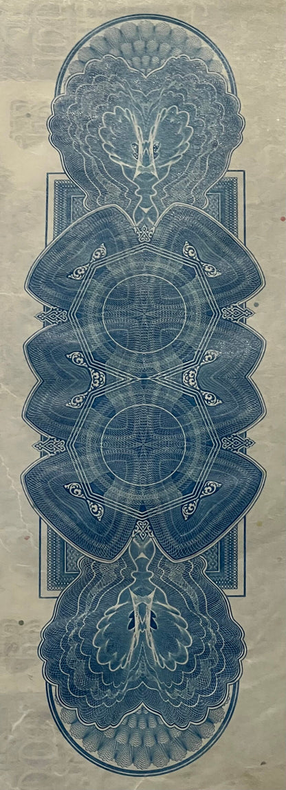 Blue and white engraved railroad bond certificate with symmetrical ornamental design featuring brain imagery at top and botto