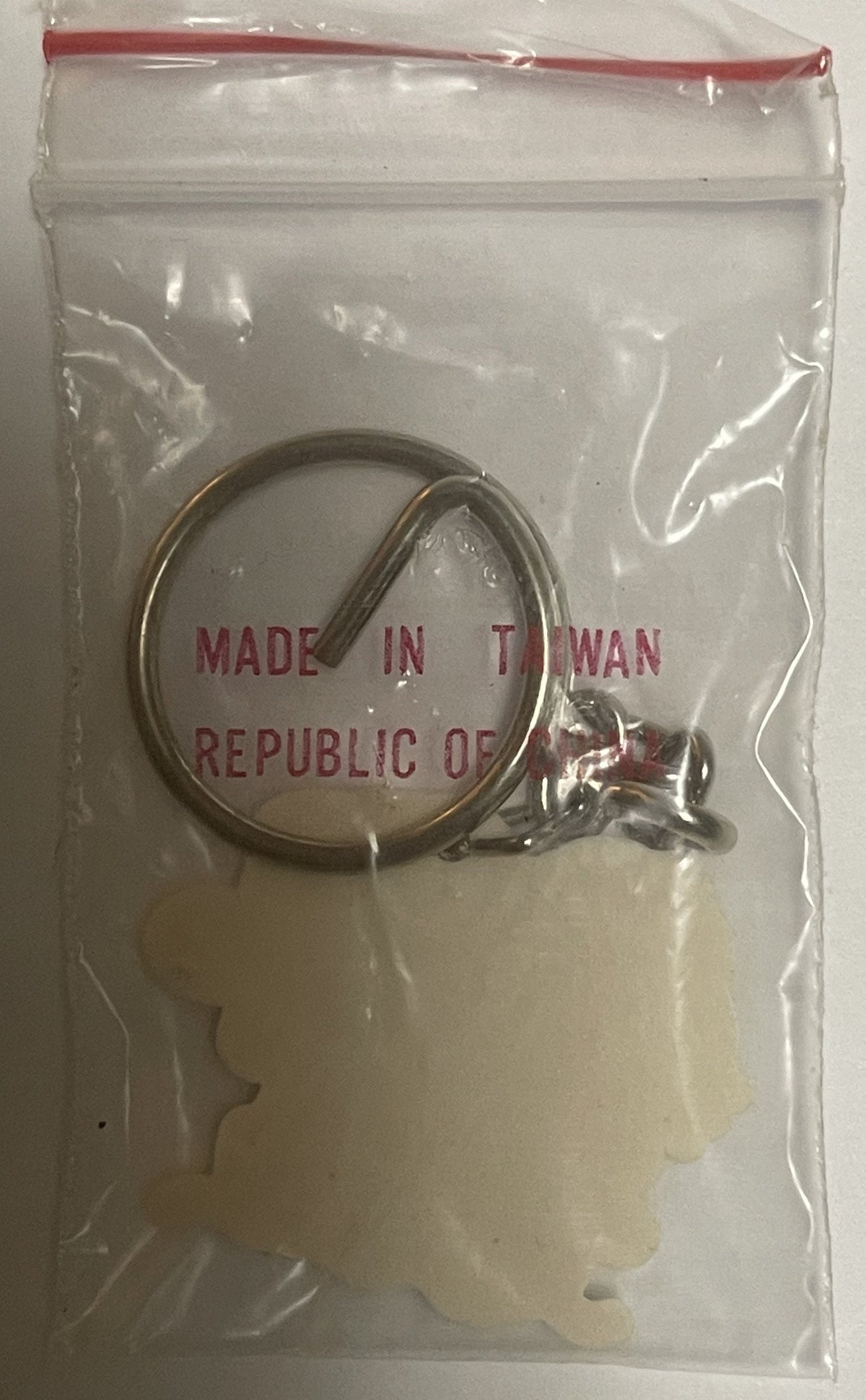 Vintage Hello Kitty sailor boat keychain in sealed plastic bag with red