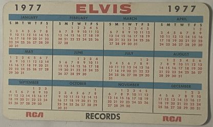 Vintage 1977 Elvis Presley pocket calendar from RCA Records showing all twelve months in blue and cream with red text