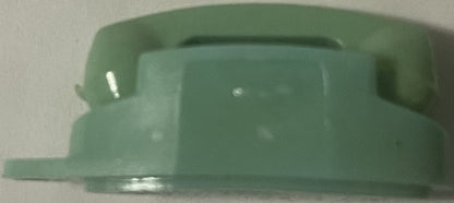Mint green rotary telephone keychain shown from above against white background, displaying curved handset and dial details