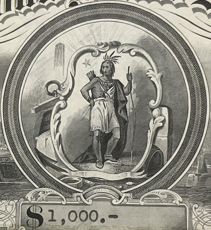 Engraved vignette from stock certificate showing Native American figure with mohawk and feathers holding spear, surrounded by