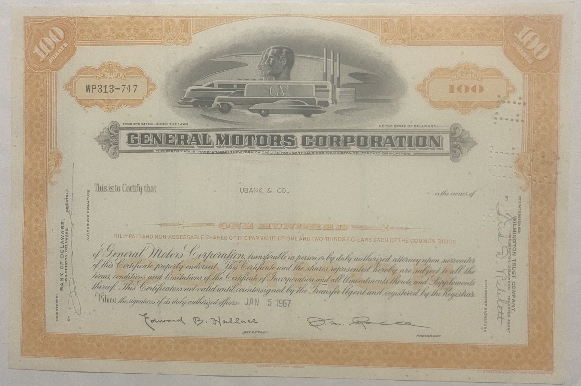 Vintage General Motors Corporation stock certificate with tan border, featuring streamlined GM train illustration and signatu