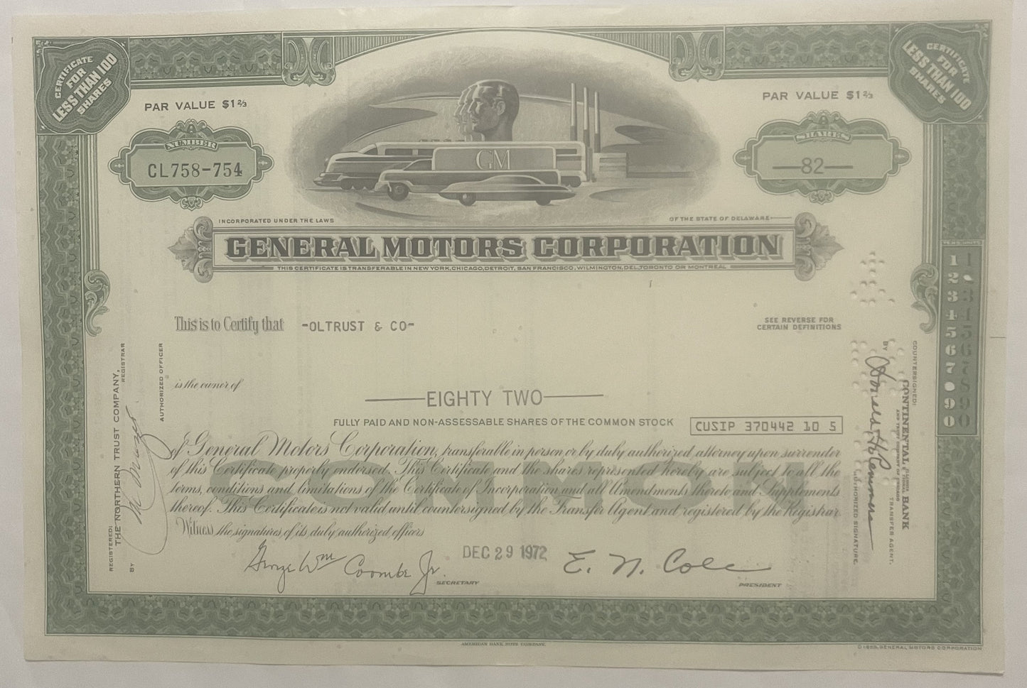 Vintage General Motors stock certificate for 82 shares, featuring streamlined GM locomotive vignette