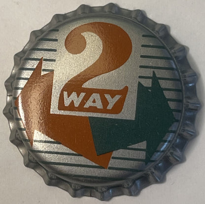 Vintage metal bottle cap with embossed ridged edges, featuring a large brown "2" and "WAY" text on silver and tan background 