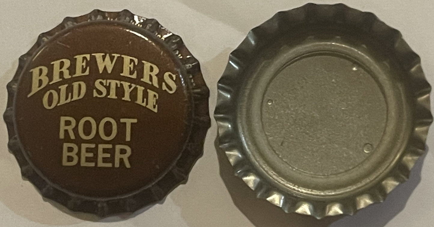 Brown and cream bottle cap with "BREWERS OLD STYLE ROOT BEER" text, shown front and back against white surface