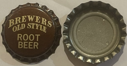Brown and cream bottle cap with "BREWERS OLD STYLE ROOT BEER" text, shown front and back against white surface