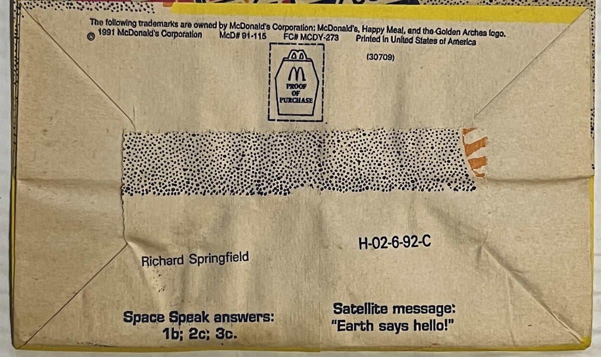 Back of vintage 1991 McDonald's Happy Meal bag with McDonald's logo, proof of purchase box, address to Richard Springfield, r