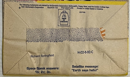 Back of vintage 1991 McDonald's Happy Meal bag with McDonald's logo, proof of purchase box, address to Richard Springfield, r